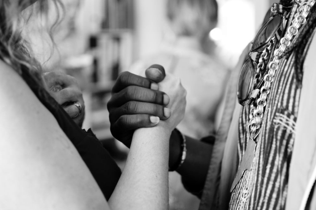 Holding hands, black and white