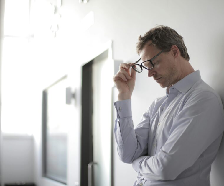 father looking down uncertain about life