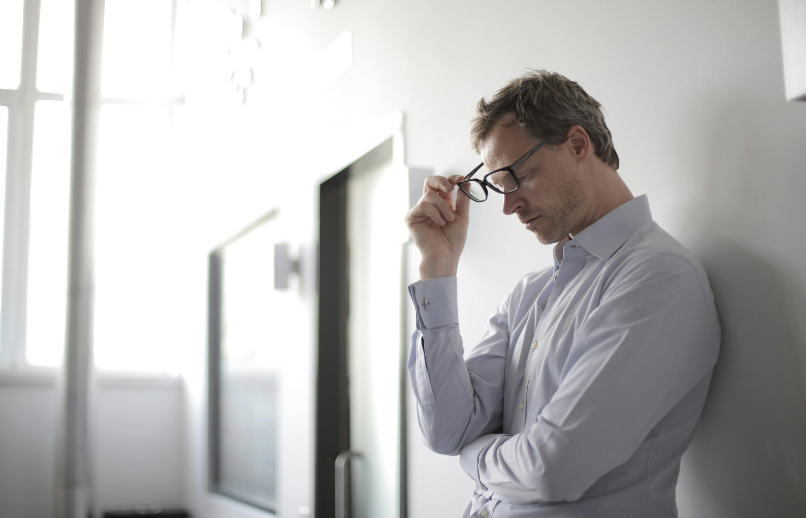 father looking down uncertain about life